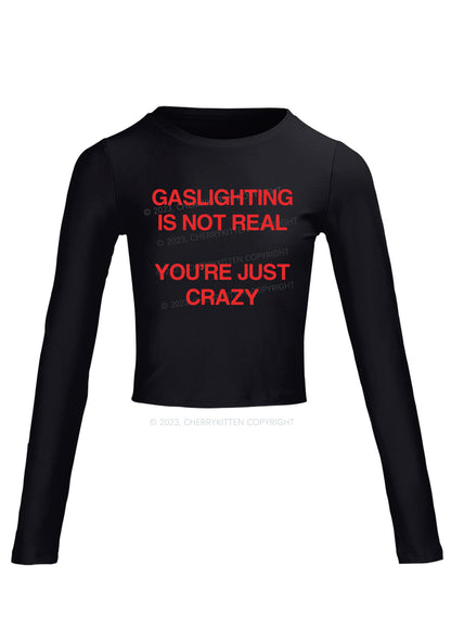 Gaslighting Not Real Long Sleeve Crop Top Cherrykitten