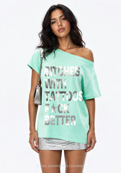 Bxxches With Tattoos Fxxk Better Silver Foil Printed Y2K Off Shoulder Tee Cherrykitten